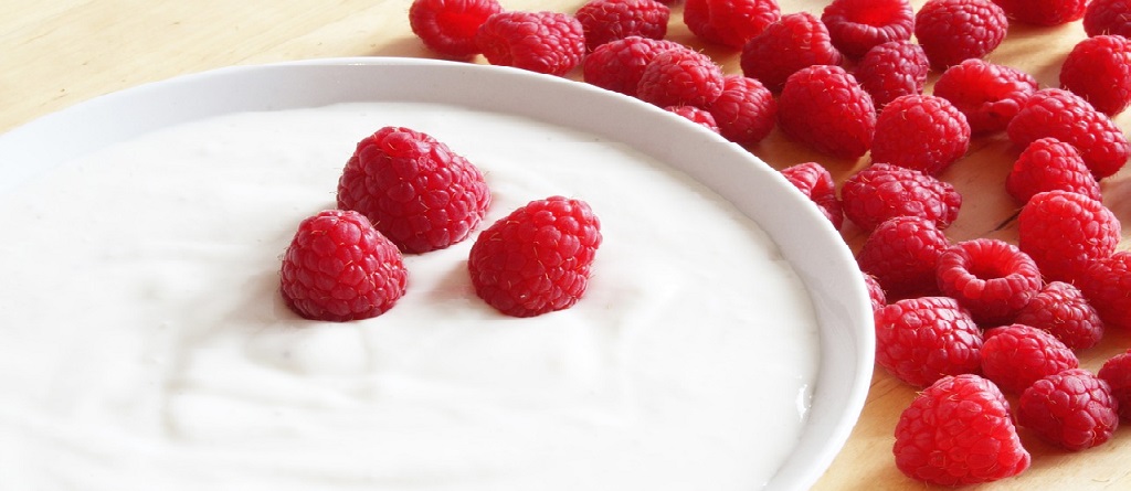 berries in a bowl of yogurt