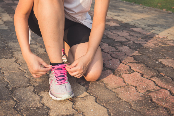 a runner wearing running shoes